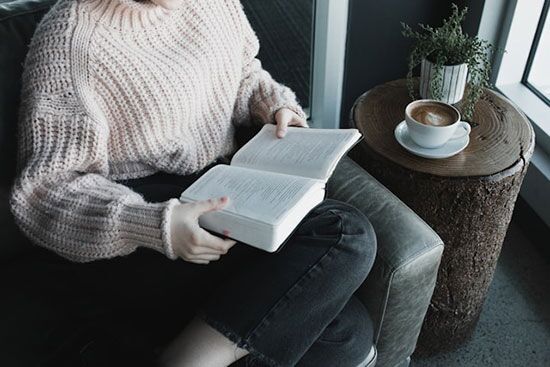 A woman reading the Bible