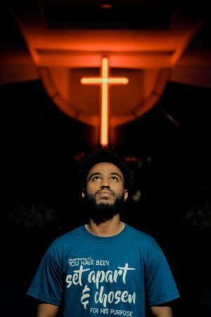 Man looking up to Cross Man look up to the Cross as we learn from the mistakes of the judges and get a glimpse of God's incredible mercy towards us.