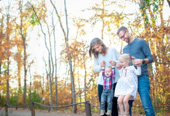 Mom, dad, and two children outdoors enjoying the Sabbath A young family enjoying the outdoors together on Sabbath.