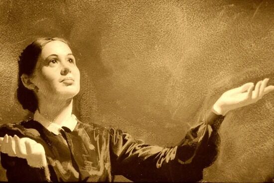 Ellen White holding her arms up as she receives a vision