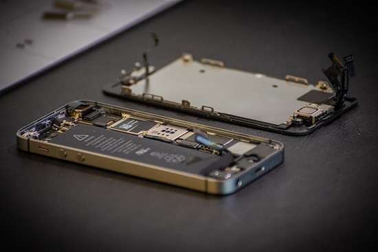 Open Cell Phone A cell phone with the back cover removed