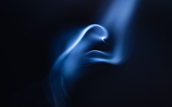 Immaterial representation of a soul A cloud of blue smoke representing a spiritual being or a soul