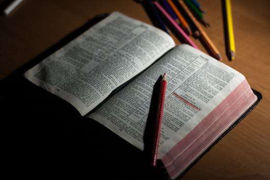 Open Bible Adventist Foundation A Bible, the basis of Adventist faith, open on a table