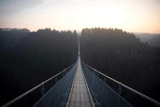 Bridge across a valley A bridge across a valley, representing the way Jesus bridges the gap between God and us