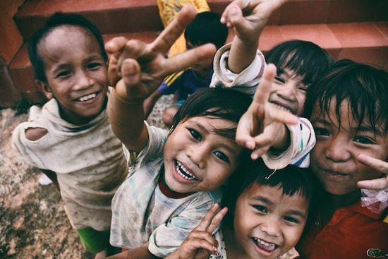 Smiling children A group of smiling Vietnamese children who have been impacted by the evangelism projects of ASI