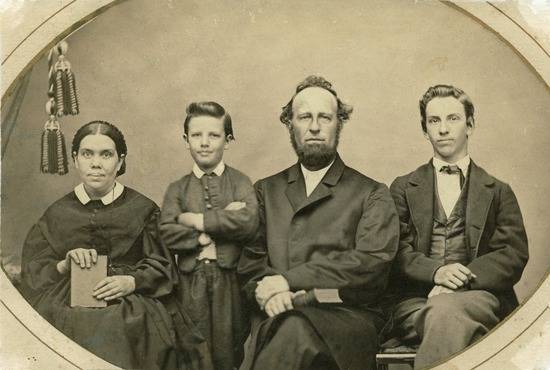 Ellen White Family A photograph of Ellen White sitting by her two sons, Willie and Edmond, and her husband, James White.