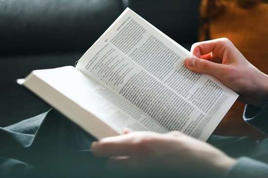 Open Bible in Matthew A person with the Bible open to the book of Matthew