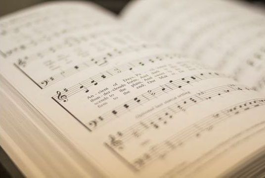  A Seventh-day Adventist hymnal open to a song