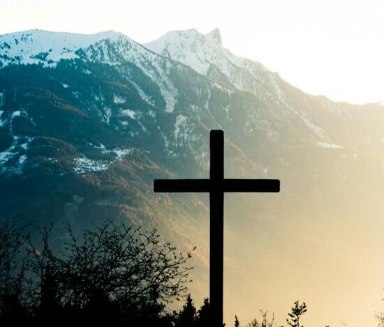 A cross, representing God's love for us in giving Jesus to die