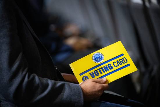 An Adventist delegate holds a voting card, which is used during the General Conference sessions.