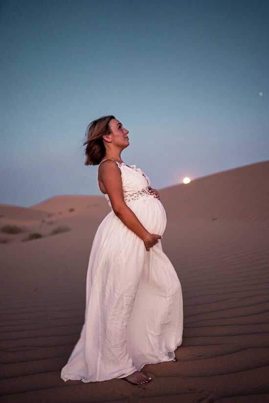 Woman from Revelation 12 A pregnant woman in a white dress, like the one Revelation 12 uses to symbolize God's people through whom the man child Jesus Christ came