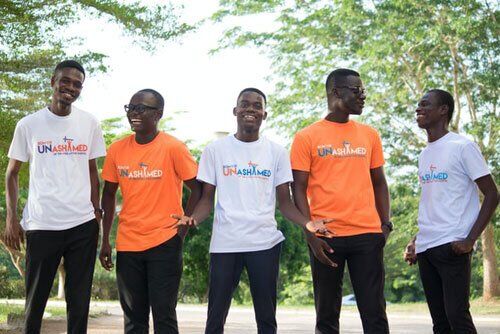 5 Male Students Outside 5 student missionaries in community outreach and mission activities that inspire a spirit of loving service to God and man