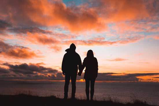 Man and Woman A husband and wife holding hands and reflecting God's image