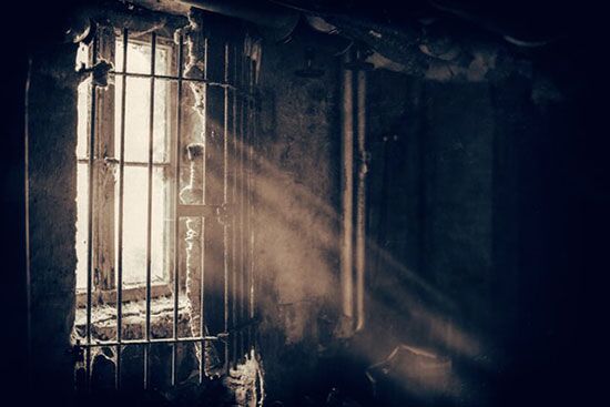 Sun rays through Prison Barred Window Sun rays shinning through the window of an old prison, as we study about Joseph's time in prison and learn from his life.