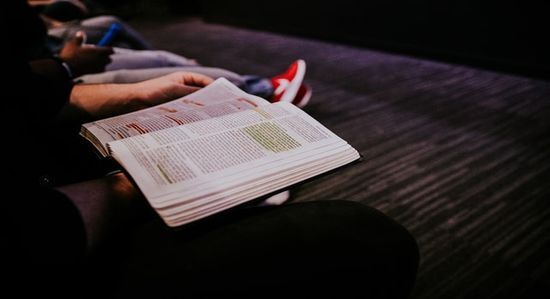 Reading Bible People in small group Bible study and discussion as we learn how the Sabbath School is a time for connection and sharing.