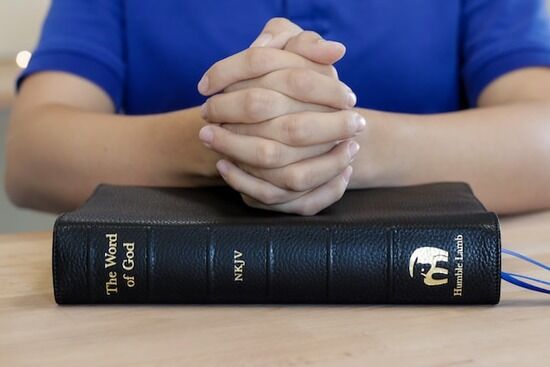 Bible Prayer Doctors and nurses in a heart surgery during a study on intercessory prayer