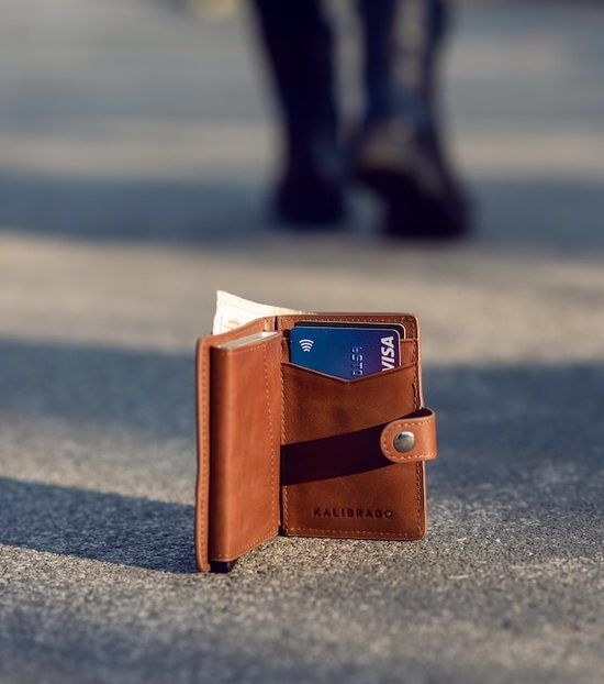 Tempting Lost Wallet A wallet on the ground that someone might be tempted to keep rather than exercise selflessness and return it