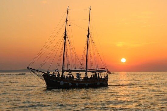 Sailboat at Sunset A sailboat with the sun setting behind