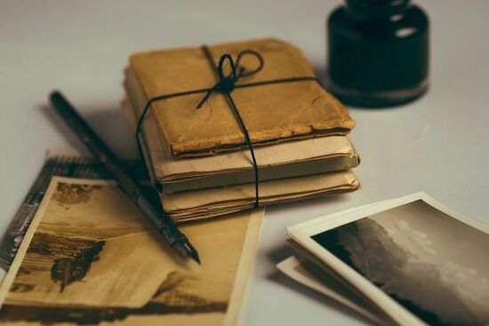 Old Letters Bundled Old brown paper and a pen