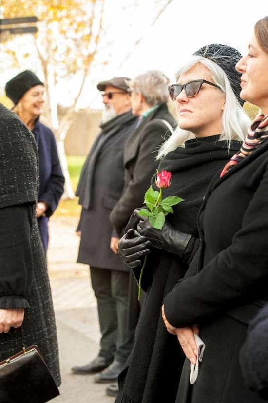 Funeral Ceremony People gathered for a funeral and burial service