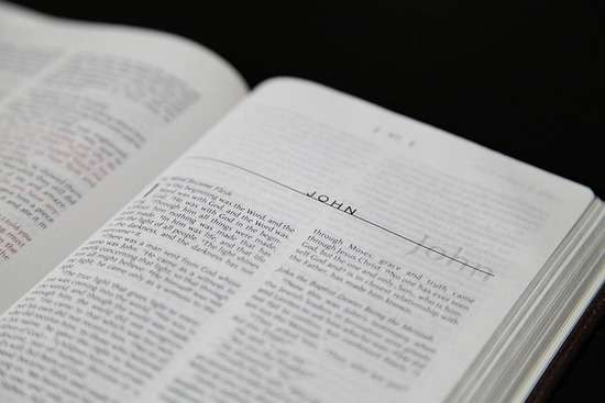 Open bible book of John The first page of the Bible book of John