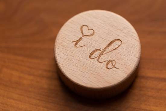I Do Ornament Marriage A wooden table decoration inscribed with the words, 'I do.'