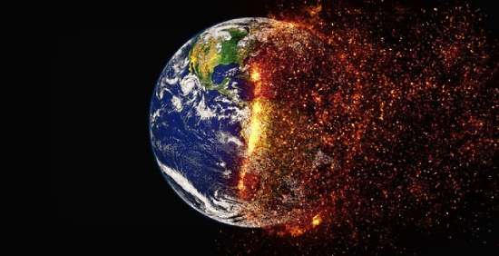 End of the World Planet Earth disintegrating into fiery embers as it's destroyed.