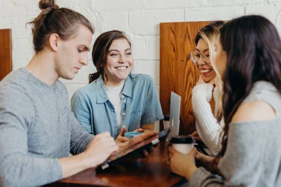 Group of Christian Friends Supporting each other A group of Christian friends interacting with each other, illustrating how having supportive friends can help us navigate life's confusion and chaos.