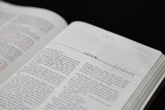 Open bible book of John The first page of the Bible book of John