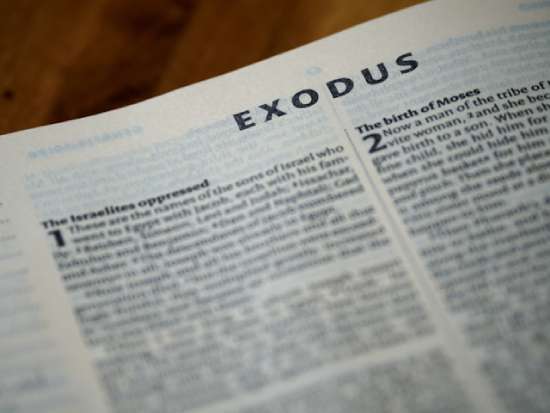 Open Bible Exodus A Bible open to the first page of the book of Exodus