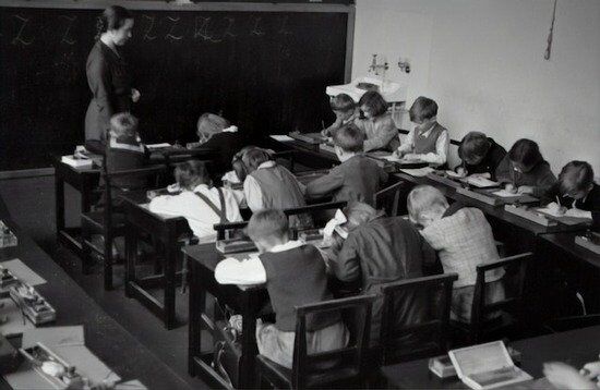 1935 Classroom A teacher and her classroom of students in 1935