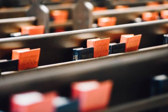Adventist Hymnals Hymnals resting in the backs of pews at an Adventist Church
