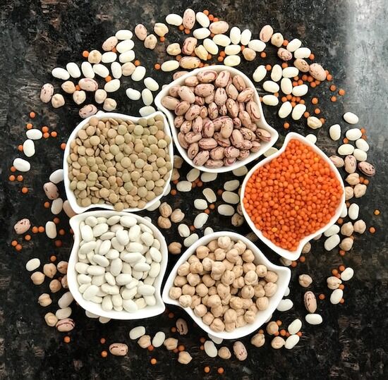 Legumes and Lentils An assortment of dry beans and lentils on a table