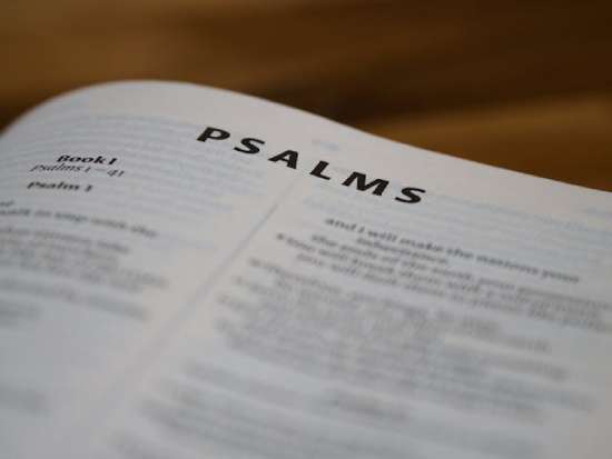 Book of psalms A close of a Bible open to the beginning of the book of Psalms, illustrating how often David depended on God and His forgiveness.