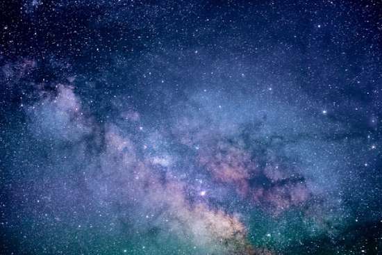 Blue and Purple Galaxy A starry sky with galaxies often illustrates God's glory.