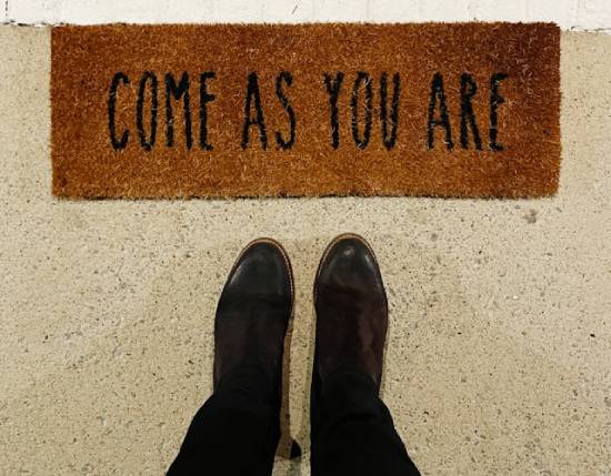 Outdoor Mat with the Words "Come as you are" A doormat that says "Come as you are," represents the grace of God.