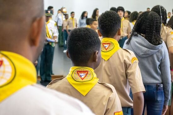 Pathfinders A group of young people lined up at a Pathfinder club meeting