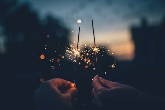 Sparklers for Holidays Hands holding sparklers for a holiday celebration