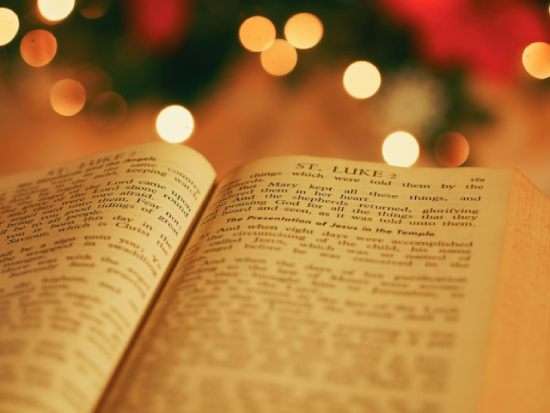 Open Bible in Luke A Bible opened up the Book of Luke where it describes the birth of Jesus.