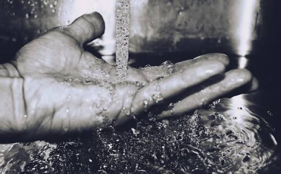 A hand facing palm-side up with water pouring over it represents how the Jewish leaders' strictly adhered to the manmade traditions like ritual handwashing. And they condemned those who didn't—like Jesus and His disciples.