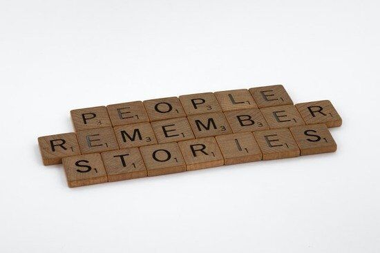 People_remember_stories wooden tiles that say people remember stories