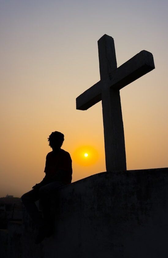 Silhouette Person at Cross A person before the Cross, accepting Jesus Christ's gift of eternal life