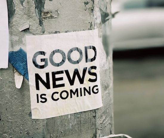 A poster proclaiming that 'good news is coming' 