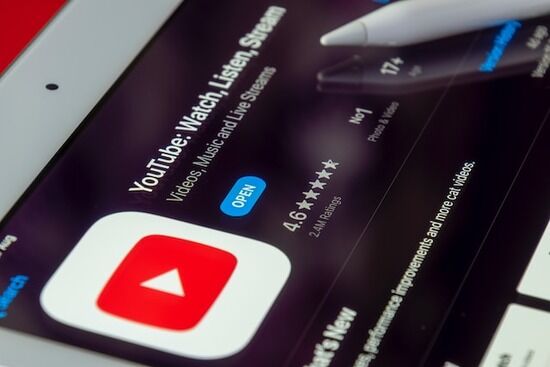 The YouTube app, where you can watch videos and listen to music, pulled up on the App Store for download.
