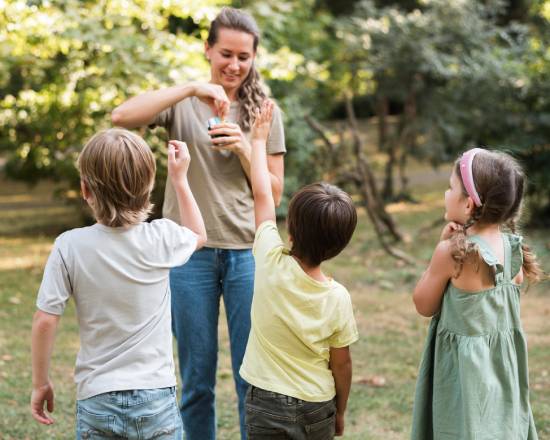 Children excitedly waiting to be called on for a VBS game